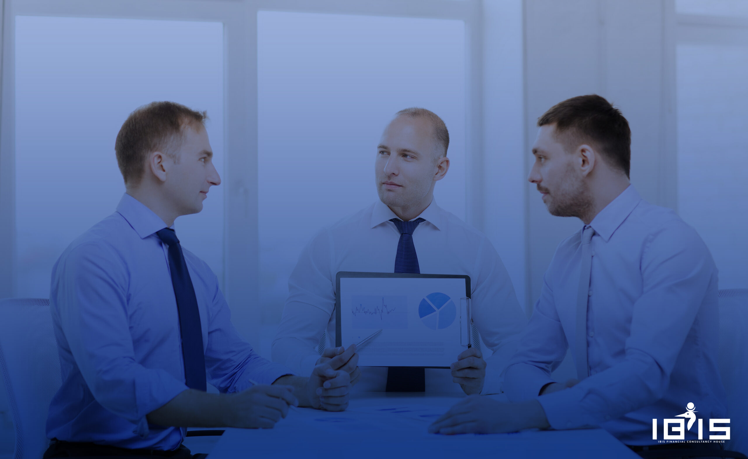 business and office concept - serious businessman showing others charts in office