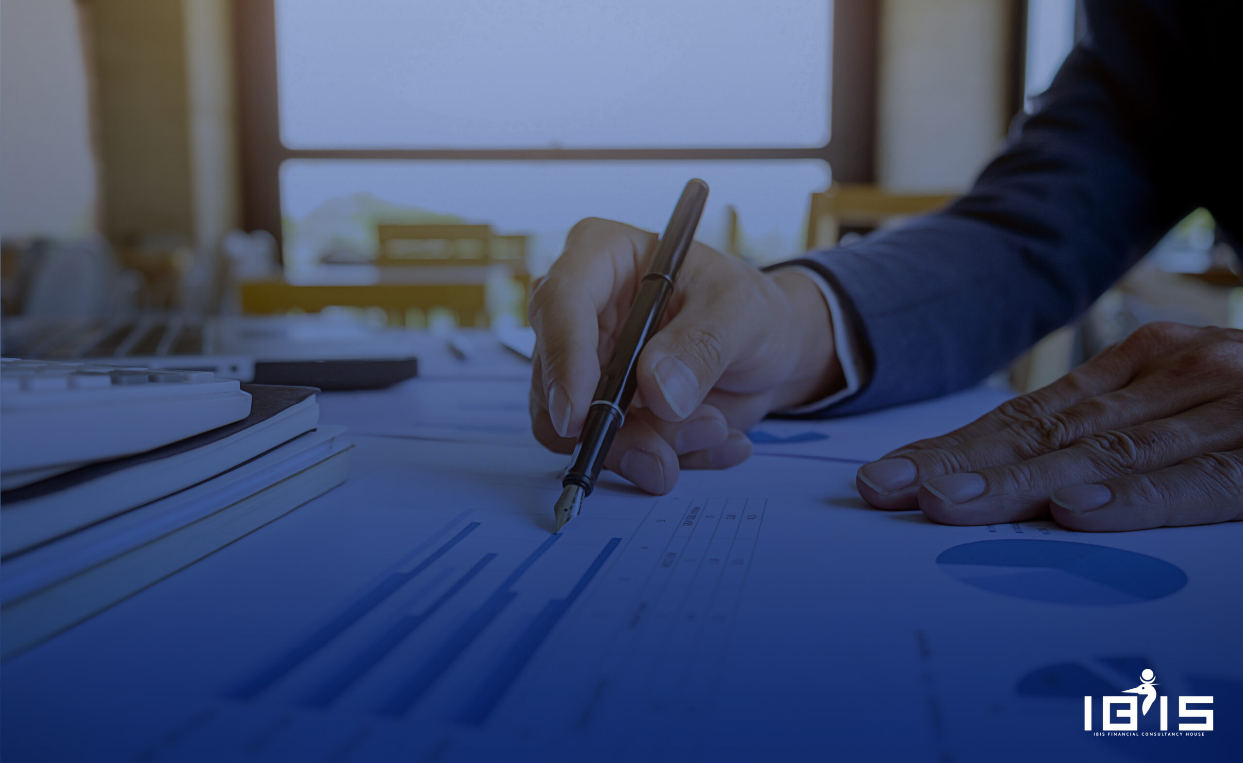 business and office concept - serious businessman showing others charts in office