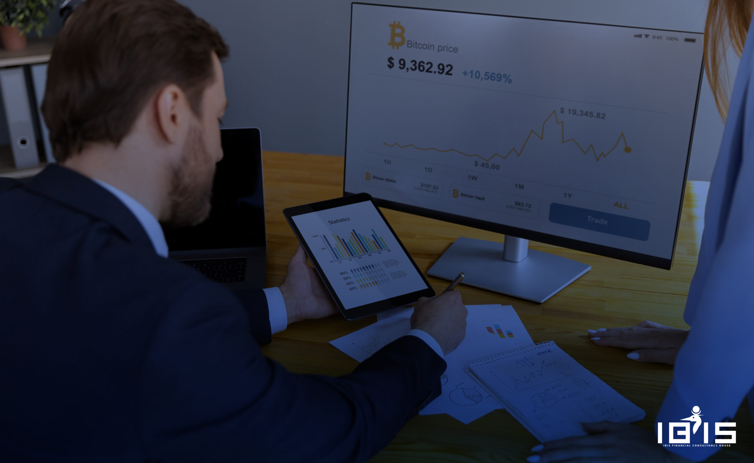 business and office concept - serious businessman showing others charts in office